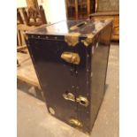 Large black painted luggage trunk