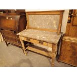 Marble top and back oak framed washstand with two drawers