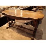 Low walnut shaped table 106 x 52 H: 55 cm