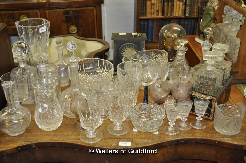 A quantity of glassware including vases, bowls, decanters, etc.