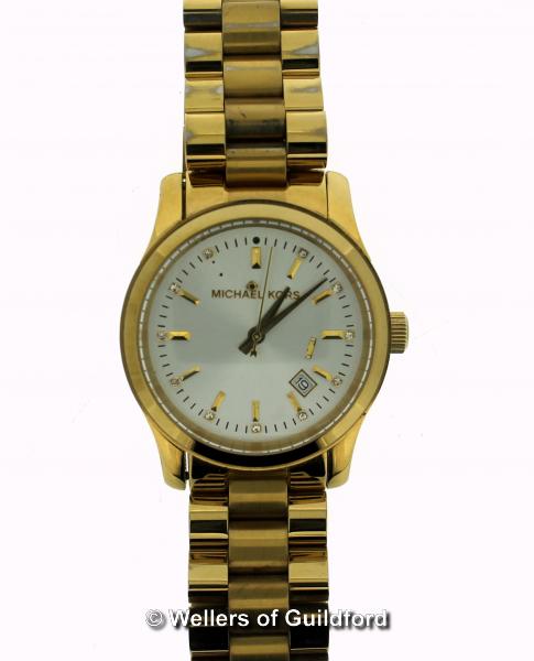 *Ladies' Michael Kors wristwatch, circular cream dial with baton and white stone hour markers,