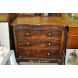 A 19th Century Continental mahogany chest with serpentine top over three long drawers, 93cm wide.