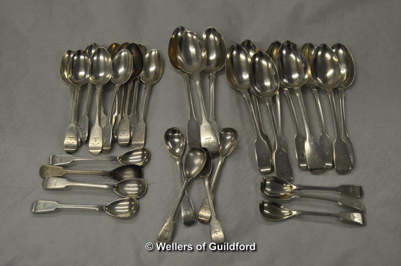 Scottish silver: a set of eight table spoons; three similar teaspoons, all Glasgow 1822; together