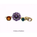 Four gem set dress rings, including an amethyst and garnet cluster ring, ring S, an orange quartz