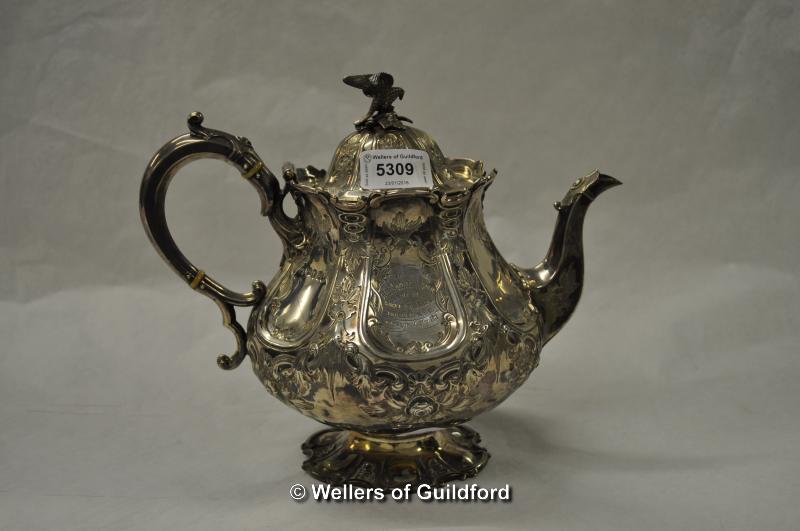 A large silver teapot with eagle finial, London 1930, 559g overall.