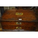 A late Victorian oak cutlery box with two drawers, lacks front, inset brass handles, 54cm wide.