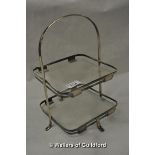 A silver plated and glass two tier cake stand.