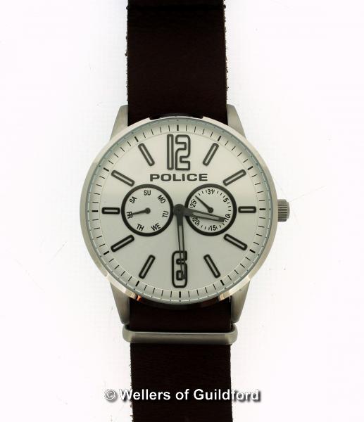 *Gentlemen's Police wristwatch, circular cream dial with two subsidiary dials, on brown leather