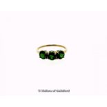 Chrome diopside three stone ring, three round cut chrome diopsides, weighing an estimated total of