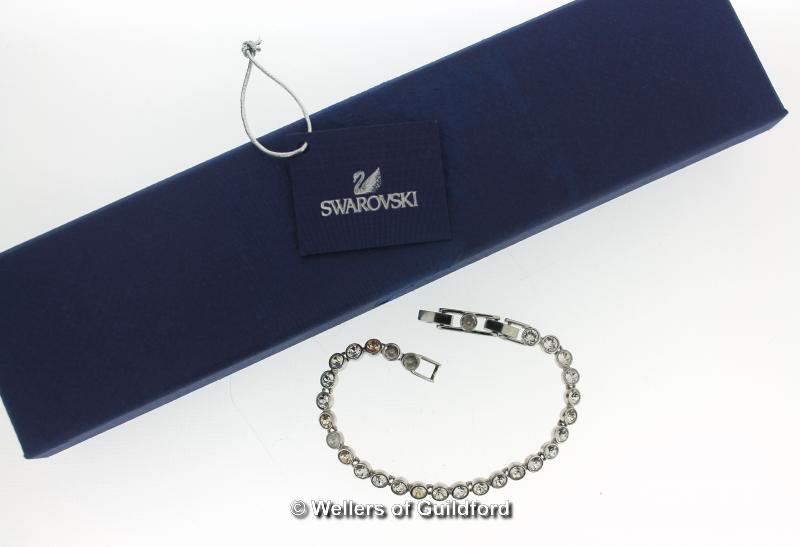 *Swarovski crystal line bracelet, length 19cm, a/f, some stones missing, boxed (Lot subject to VAT)