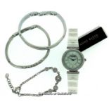 *Ladies' Anne Klein wristwatch, circular white dial with white stone set bezel, white strap,