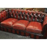 *Red leather Chesterfield sofa (Lot subject to VAT)