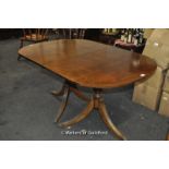 Reproduction solid mahogany twin pillar dining table, with extra section