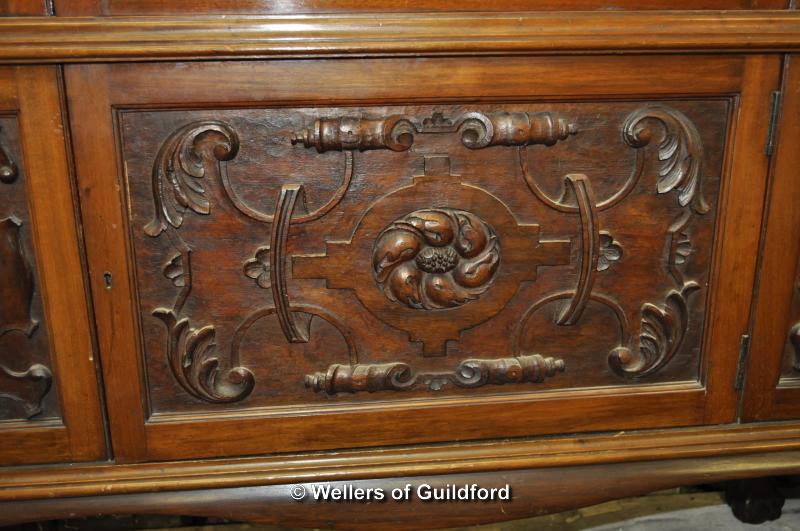 An Edwardian mahogany display cabinet witharched top over an astragal glazed door with panelled door - Image 2 of 4