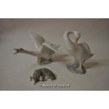 Lladro figurines: hissing swan, A-18A, (16cm wingspan); together with a preening swan (11cm high)