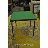 A folding card table.