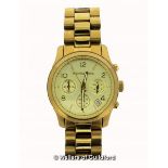 *Michael Kors wristwatch, circular champagne coloured dial, with Arabic numerals and baton hour