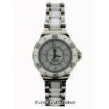 *Ladies' Tag Heuer Formula 1 automatic wristwatch, circular white dial with rotating bezel,