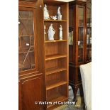 A modern tall open bookcase with adjustable shelves, 182.5 x 50cm.