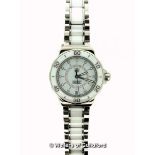 *Ladies' Tag Heuer Formula 1 automatic wristwatch, circular white dial with rotating bezel,