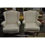 Pair of cream wingback armchairs