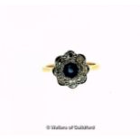 Antique sapphire and diamond floral cluster ring, central round cut sapphire with a surround of