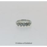 Five stone diamond ring, round brilliant cut diamonds mounted in white metal, stamped as 14ct,