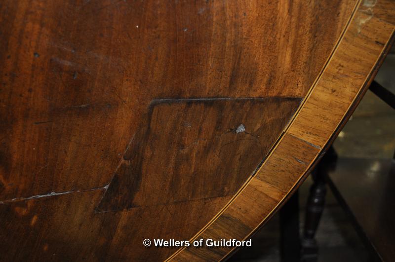 A George IV crossbanded oval mahogany tilt top breakfast table on tripod support, 120 x 91cm. - Image 4 of 4