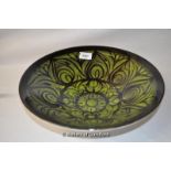 Poole Aegean bowl, no. 58, decorated with black on green ground, 10 x 33.75cm.