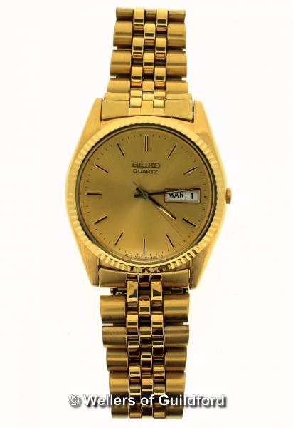 Gentlemen's vintage Seiko wristwatch, in gold tone stainless steel, with baton hour markers and date