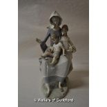 Lladro figurine, mother with child and toddler admiring a butterfly, 38cm high