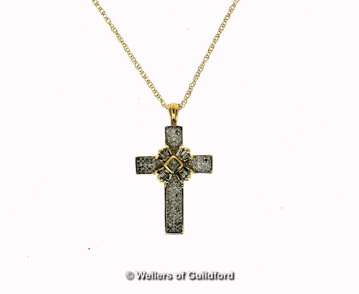 *Diamond set cross pendant, mounted in yellow metal stamped 14ct, on a yellow metal fine chain,