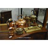 A brass spirit kettle on stand, brass chestnut roaster, copper kettle and other items of metalware.