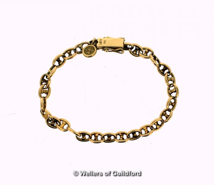 Yellow metal fancy link bracelet, stamped as 14ct, with a 9ct gold St Christopher charm, length