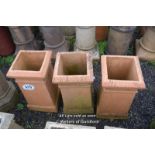 *SET OF THREE TERRACOTTA CHIMNEY POTS, EACH 620 HIGH