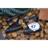 *TWO CAST IRON HAND IRONS
