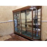 *VICTORIAN BOW END MAHOGHANY FULLY GLAZED JEWELLERS CABINET APPROX 7FT X 6FT