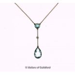 Aquamarine and diamond drop pendant, round cut aquamarine set at the top, with a round cut diamond