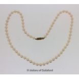 Single row pearl necklace, length 47cm, yellow gold clasp stamped with French hallmark for 18ct