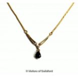 Sapphire and diamond necklace, three round brilliant cut diamonds with a pear shaped sapphire