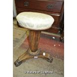 A Victorian rosewood adjustable piano stool with overstuffed seat on hexagonal column terminating in