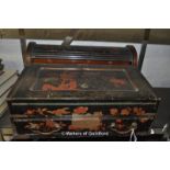 A late 19th Century Japanese lacquer lap desk, tambour top and the lifting lid with drawer below.