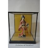 A Japanese doll in display case, 39 x 32 x 37cm.