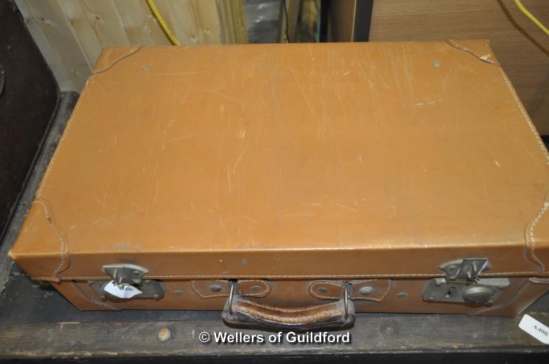 A wood and canvas trunk and two leather suitcases. - Image 4 of 7