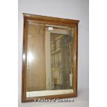 A walnut framed wall mirror, 76 x 54.5cm