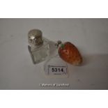 A porcelain scent bottle modelled as a strawberry, the silver lid Birmingham 1920, 5.75cm; a