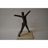 A bronze of a nude doing a star jump, rectangular marble base, 40cm