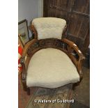 An Edwardian mahogany salon chair.