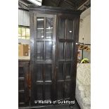 A 20th Century dark wood cabinet with glazed doors, 203 x 93 x 36cm.