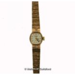 Ladies' Rotary 9ct gold wristwatch, small silvered dial with baton hour markers, presentation